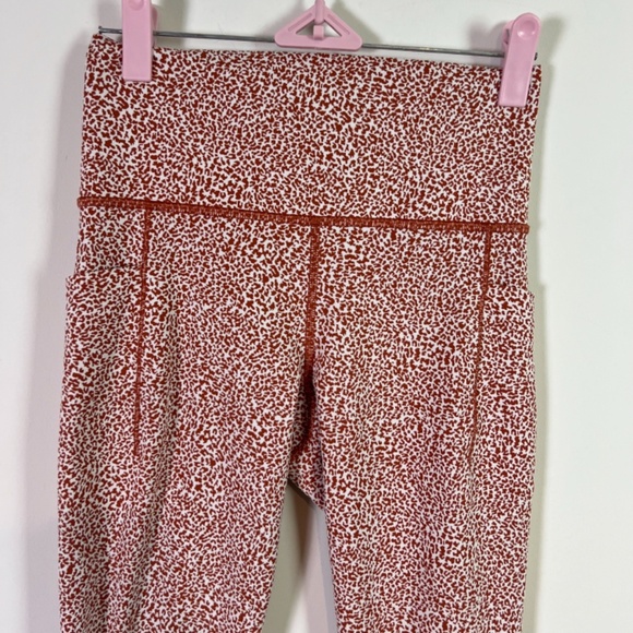 Athleta Salutation Stash II Textured Tight Rust Micro Cheetah Print Leggings - Picture 3 of 9